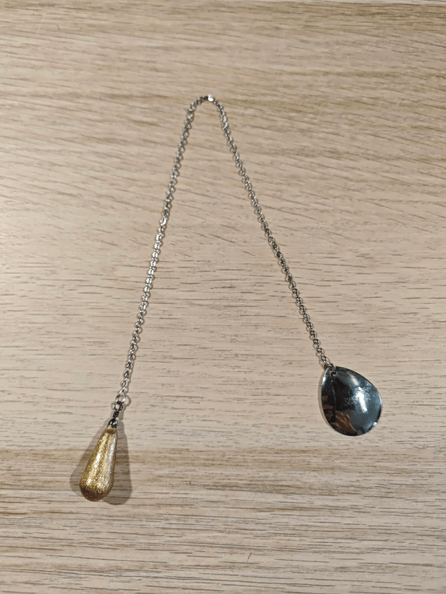 Pendule "goutte" - doré