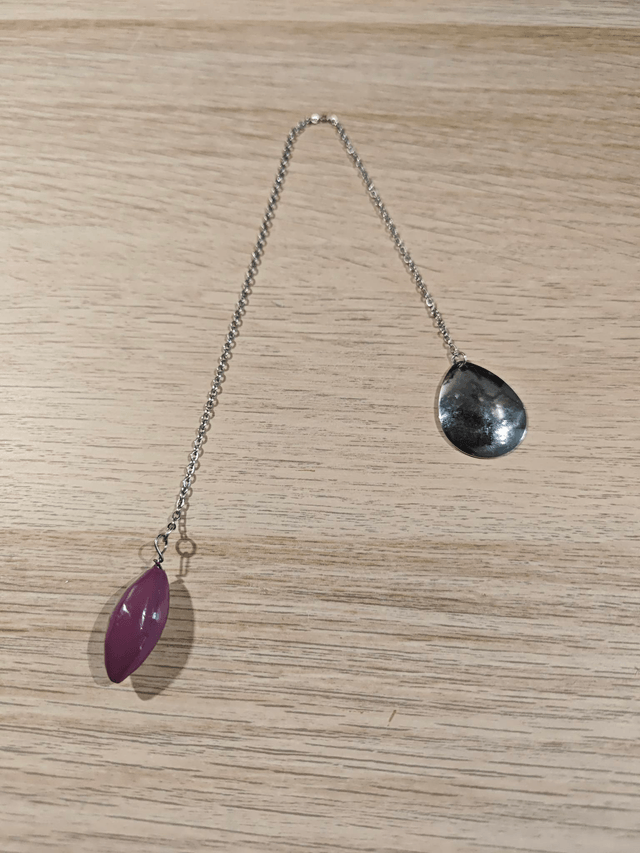 Pendule olive - violet