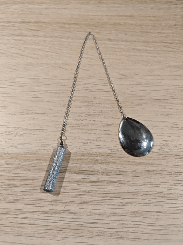 Pendule baton - argenté 