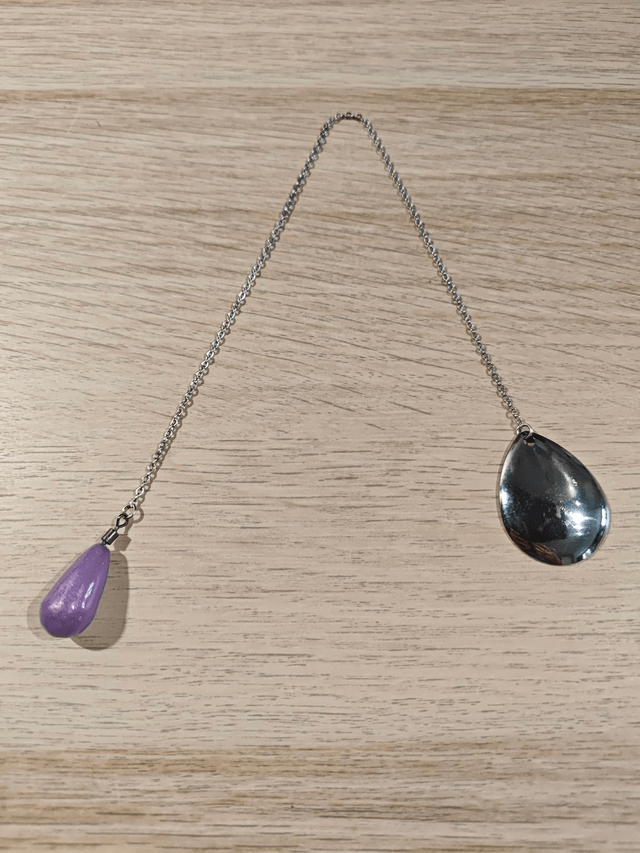 Pendule "goutte" - mauve nacré