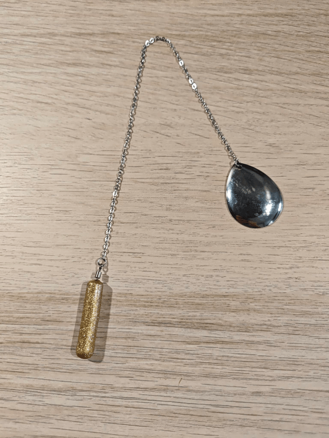 Pendule baton - doré