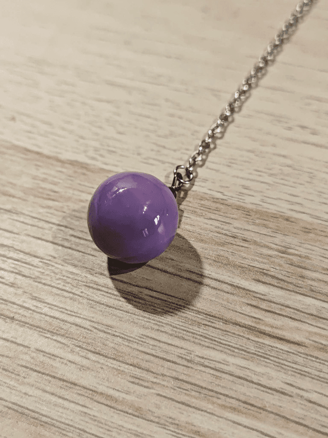 Pendule boule - violet