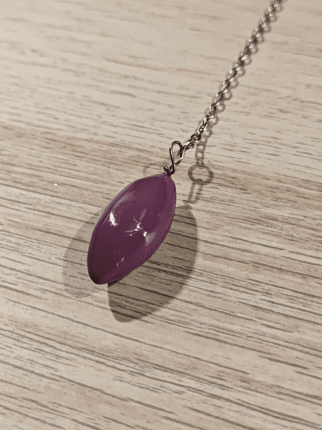 Pendule olive - violet