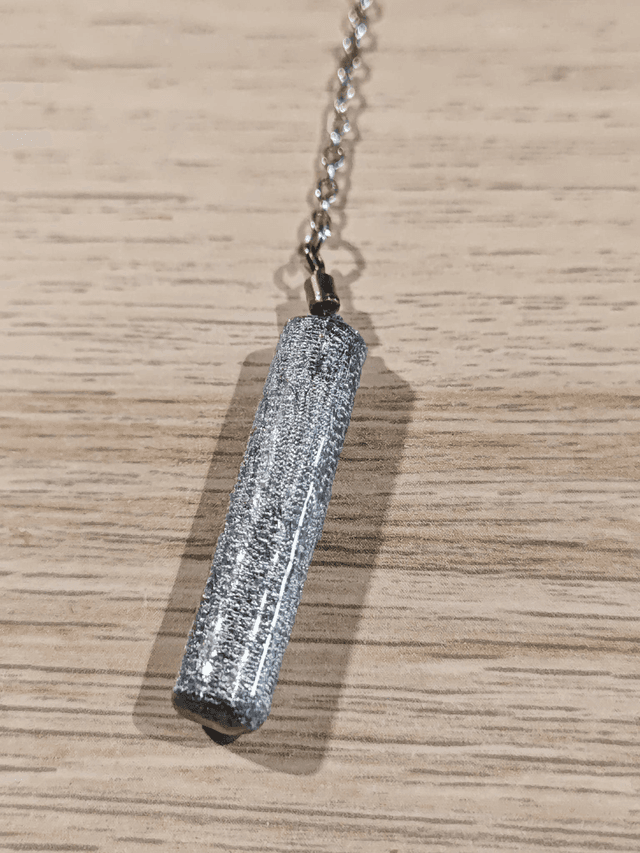 Pendule baton - argenté 